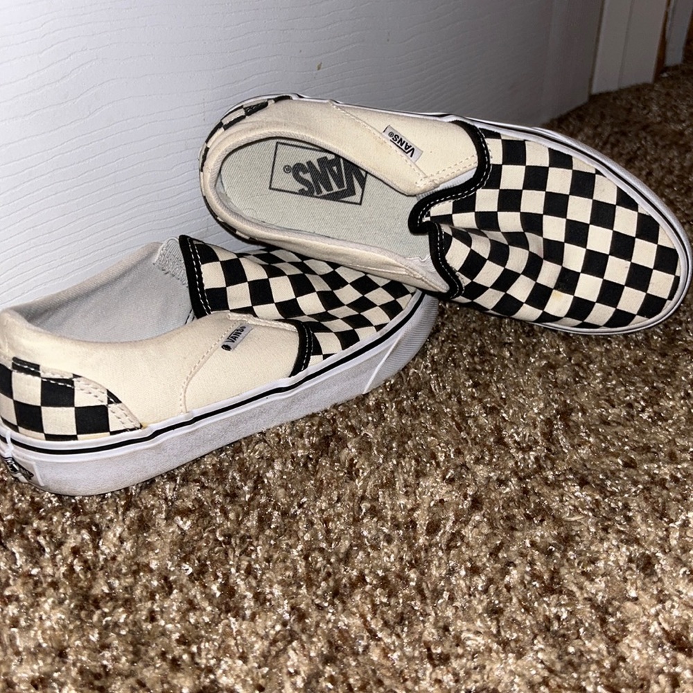 Checkered vans.